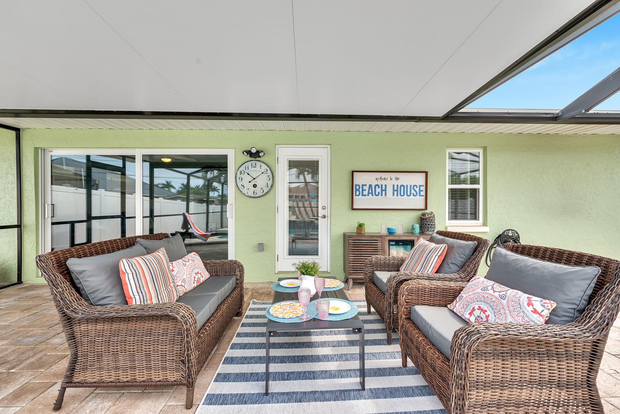 Second outdoor sitting area beside the pool