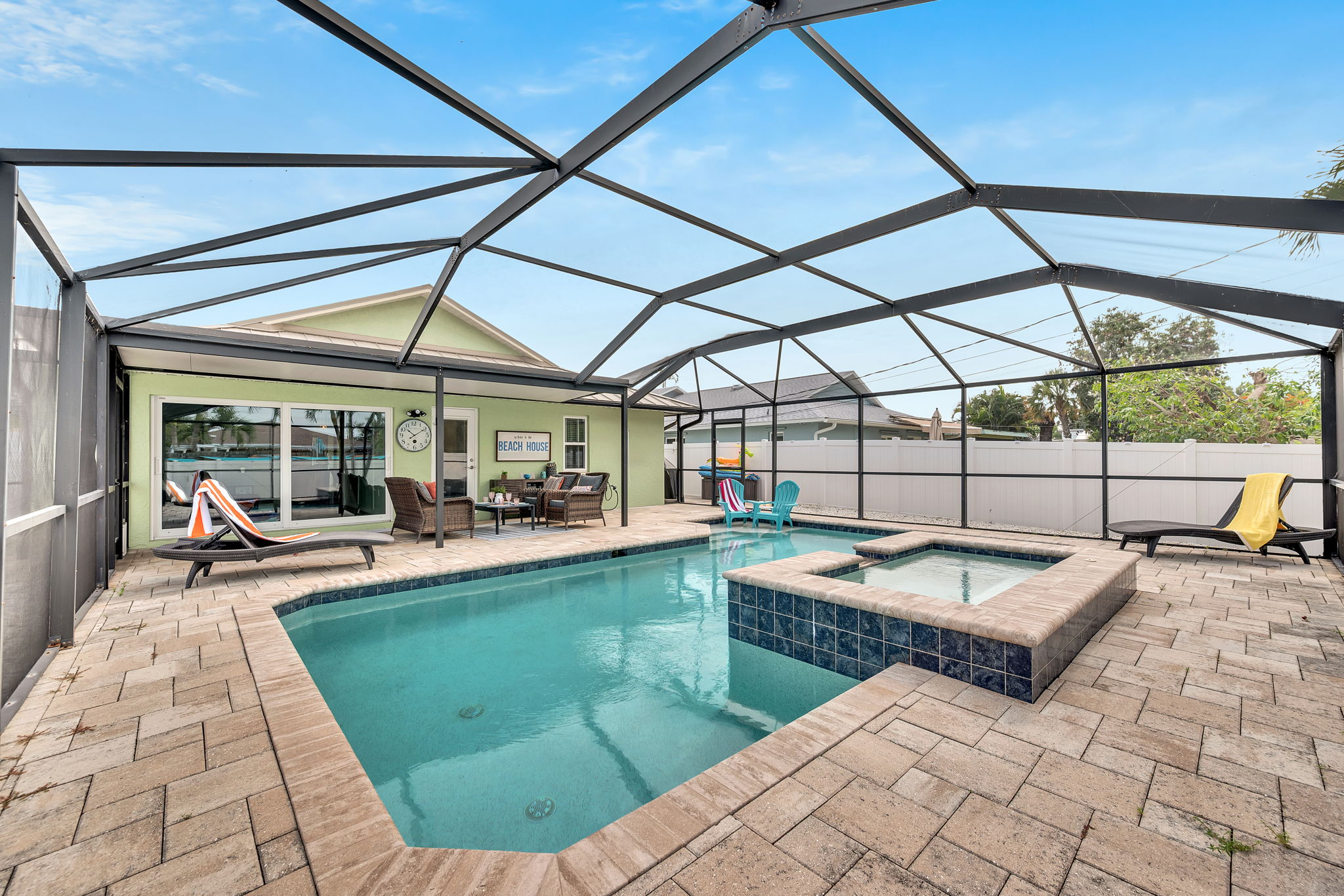 Private pool and spa surrounded by tropical landscaping